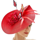 red butterfly fascinator hat