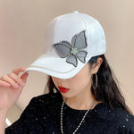 white abstract butterfly cap