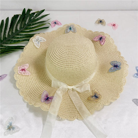 beige butterfly straw hat