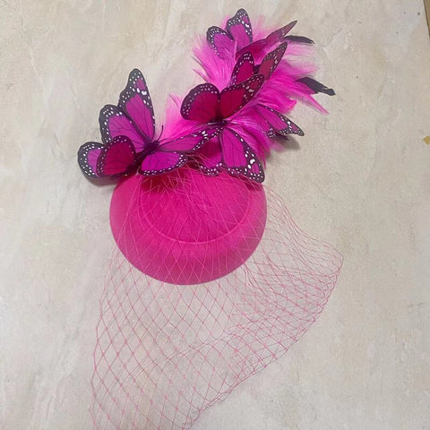 deep pink monarch butterfly fascinator hat