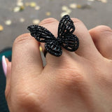 black butterfly ring mysterious