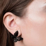 black butterfly ring set on ears