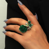 butterfly flower ring on finger