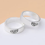 silver butterfly couple ring on table