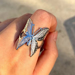 butterfly shaped ring on finger