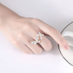 crystal gold butterfly ring on finger