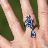 festival butterfly ring on finger