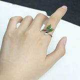 green jade butterfly ring on finger