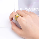 honeycomb butterfly ring on finger