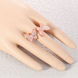 mother of pearl butterfly ring pink on finger