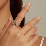 purple crystal butterfly ring on finger