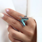 silver turquoise butterfly ring on finger